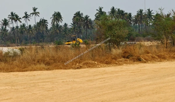 Wide view of the fully cleared and leveled sandy grounds prepared for the Sobha One Residences property