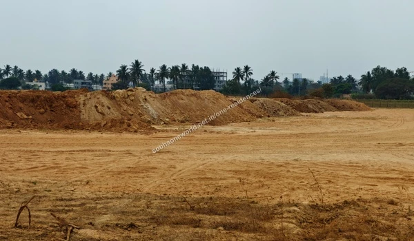 Ongoing earthwork and grading progress with natural greenery preserved at the Sobha One Residences site
