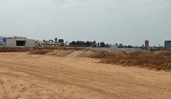 Assorted mounds of excavated soil prepared for grading at the Sobha One Residences construction grounds