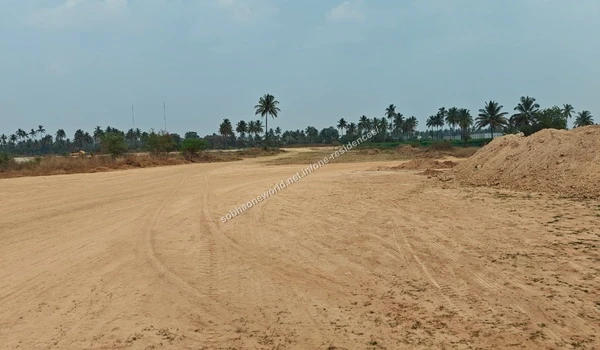 Assorted mounds of excavated soil and sand stretching across the Sobha One Residences site