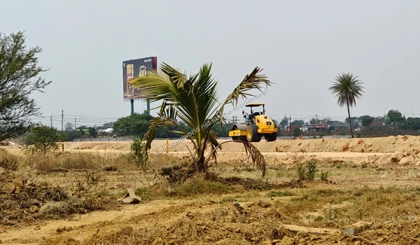 Extensive ground preparation and soil leveling activities visible across the Sobha One Residences property