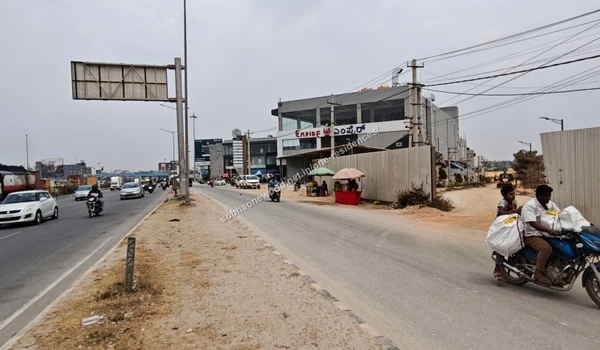 Local commuters traveling on the highway access point directly outside the Sobha One Residences project