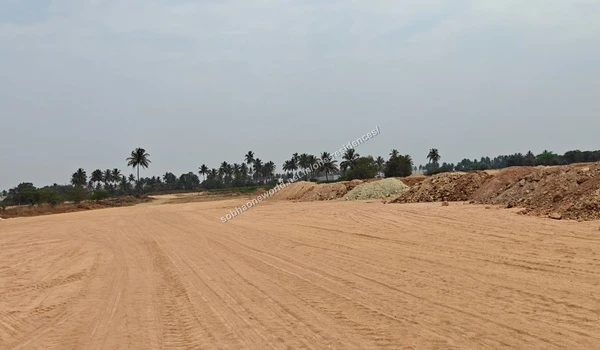 Wide view of the internal pathways and compacted dirt roads being developed at Sobha One Residences