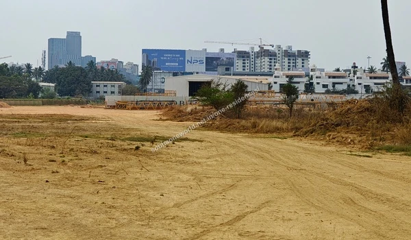 Broad view of the internal site layout and earthworks progressing towards the palm trees at Sobha One Residences