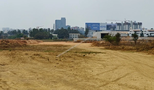 Wide open expanse of fully graded sandy terrain preparing for development at Sobha One Residences