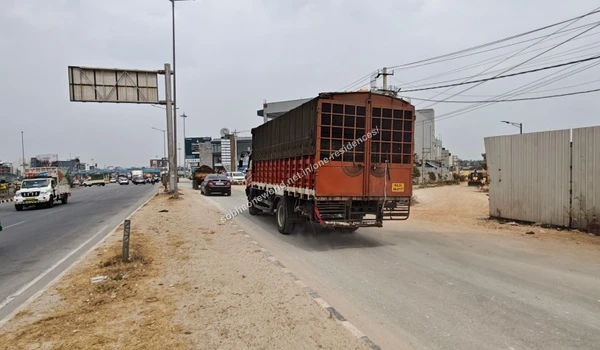 A clear view of the pedestrian edge and dirt pathway marking the future development area for Sobha One Residences