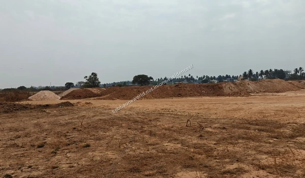 Ongoing plot development and graded earth surfaces at the Sobha One Residences property location