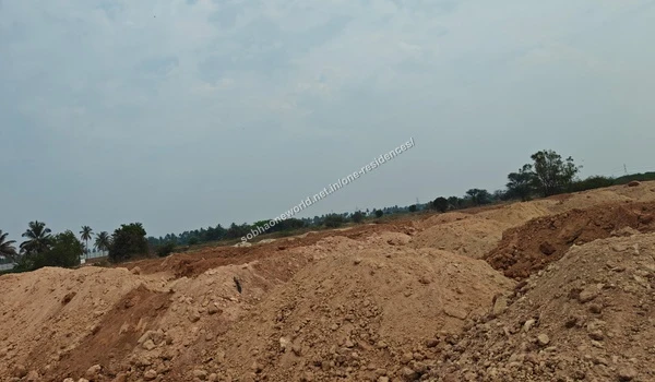 Elevated and compacted sandy access road running through the Sobha One Residences construction grounds