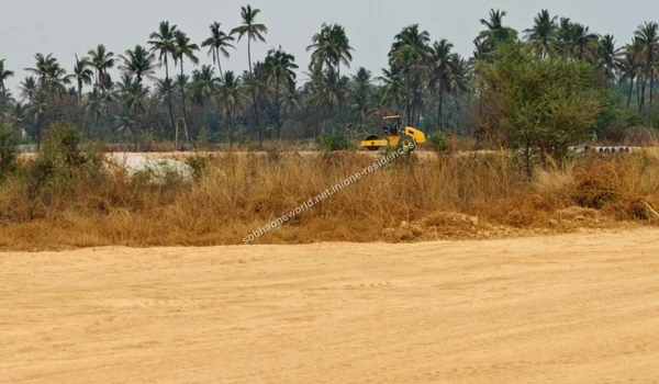 Assorted heaps of excavated earth and soil materials lined up across the Sobha One Residences construction site