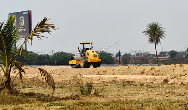 View of the temporary site infrastructure and leveled sandy grounds at the Sobha One Residences property