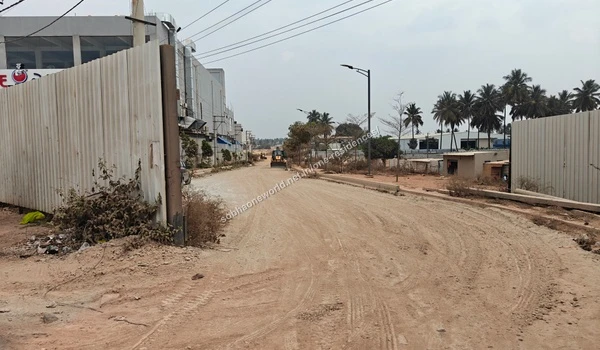 A man riding a blue scooter along the main transit route that provides excellent connectivity to Sobha One Residences