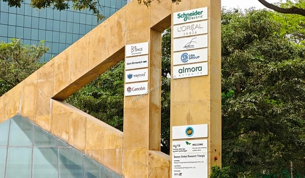 Close up view of the Brigade Signature Towers entrance sign representing prominent IT parks near Sobha One World