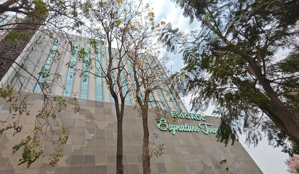 Close up perspective of Brigade Signature Towers highlighting the proximity of premium workspaces to Sobha One World