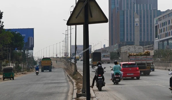 Scenic view of the road infrastructure with prominent commercial towers in the vicinity of Sobha One World