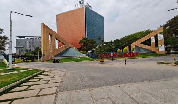 Scenic corporate campus view showing the modern glass architecture and dedicated entryways accessible from Sobha One World