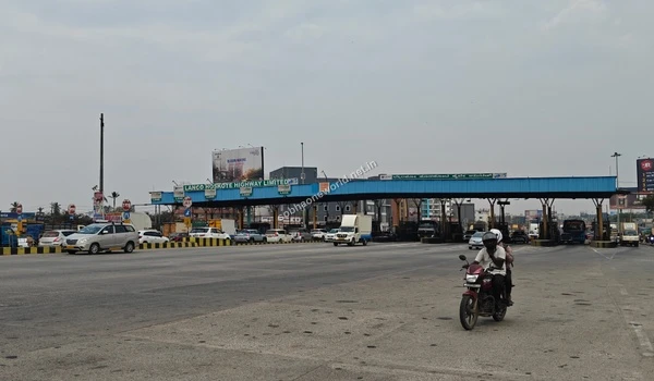 The streamlined expressway infrastructure near Hoskote Toll serving the Sobha One World community