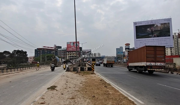 Scenic perspective of the main road heading towards KR Puram right from the entrance of the Sobha One World project