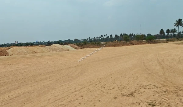 Different sections of graded earth and mixed soil piles highlighting the extensive ground preparation work completed so far at Sobha One World.