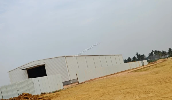 Angled exterior view of the large temporary site office facility being built for the Sobha One World project