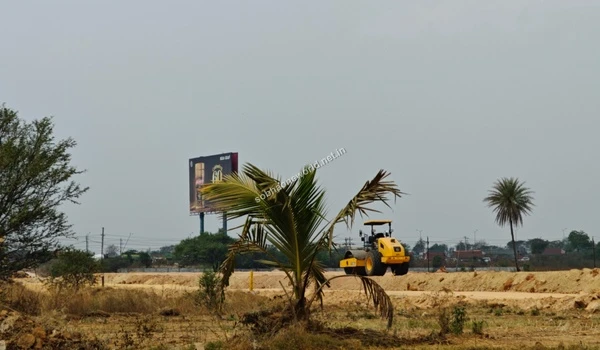 Ongoing terrain leveling visible along the dirt tracks at the Sobha One World location.