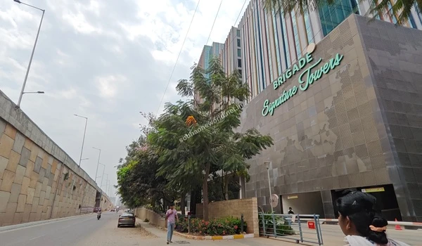 Commuters passing by the grand entrance of the premium employment zone ensuring a hassle-free transit near Sobha One World