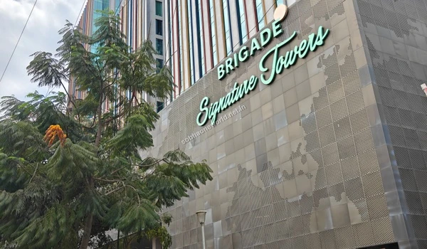 Modern glass architecture of the commercial buildings reflecting the premium standard of commercial hubs near Sobha One World