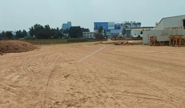 Broad view of the prepared foundation ground showing the vast scale of the cleared Sobha One World residential site.