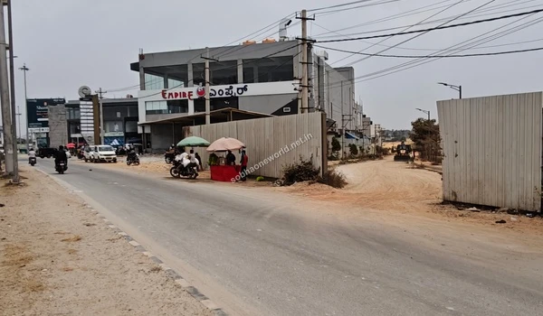 View of the designated access lane leading directly to the Sobha One World construction site entrance.