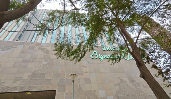 Clear paved access leading into top-tier tech parks illustrating excellent business infrastructure around Sobha One World