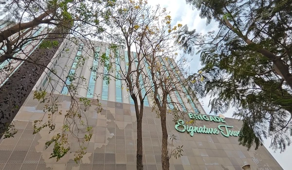 Busy street view of the adjacent tech corridor emphasizing the convenient walk-to-work lifestyle at Sobha One World